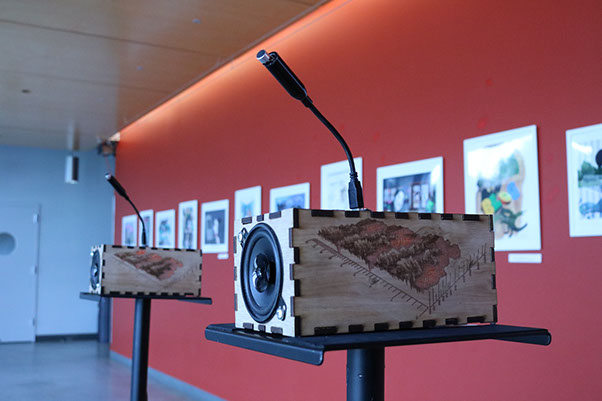 Two Sonic Mirrors placed on pedestals in a hallway at the Digital Arts and New Media program at UC Santa Cruz.
