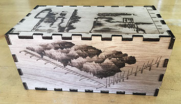 The Sonic Mirror's enclosure features laser engraved images of spectrograms and waveforms of the spoken words "sonic mirror."